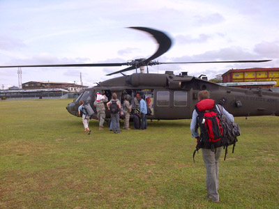 David Blackley, CDC responder, prepares to board a U.S. Army helicopter to travel to a remote village in Liberia as part of a RITE (Rapid Isolation and Treatment of Ebola) team.