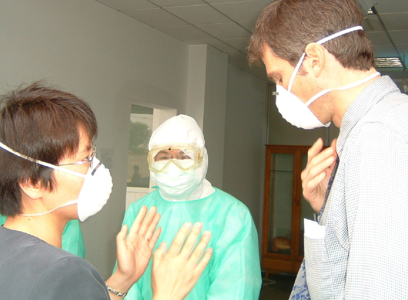 CDC epidemiologists Daniel Feikin and Fujie Xu at a fever clinic in Beijing, 2003