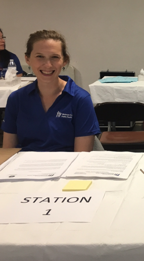 Sally Ann Iverson, DVM, MPH, EIS Class of 2016, prepares to interview vaccination clinic participants during a 2017 outbreak of Hepatitis A among people experiencing homelessness in Maricopa County, Arizona.