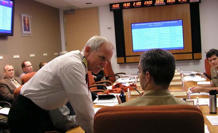 Members of the 2009 H1N1 Pandemic response leadership team meet in the executive conference room 