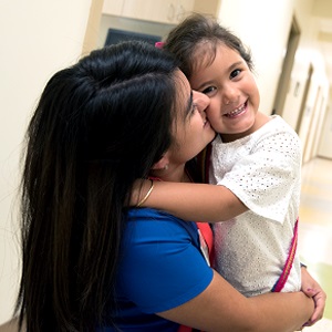 Picture of a woman hugging her child