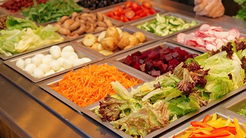 Colorful and appealing foods on a salad bar