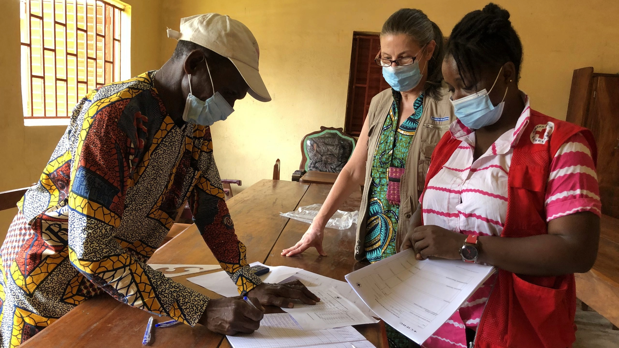 workers check community feedback data