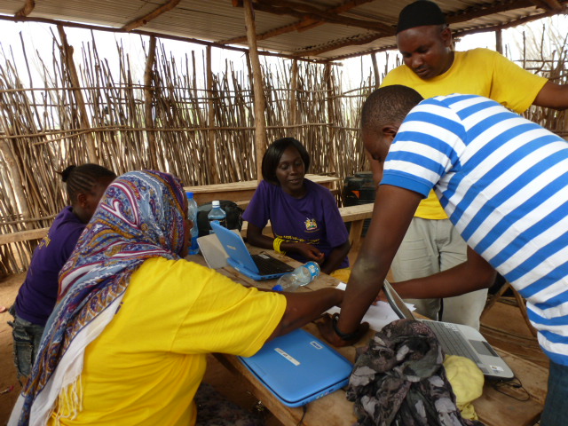 In Garfasa, Kenya, Kenya Medical Research Institute staff provide IT support for the netbooks used by interviewers in implementing the Kenya AIDS Indicator Survey