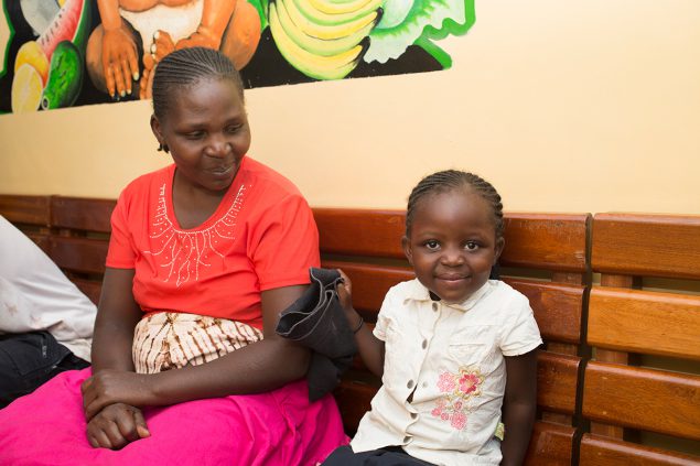 Mother and child sitting