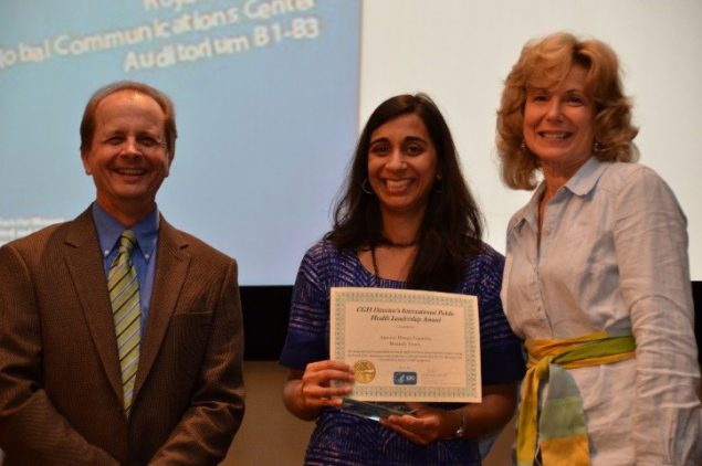 Dr. Pratima Raghanthan (Center) receives the 2013 CGH Honor Award on behalf of CDC Rwanda. The award was presented by Dr. Thomas Kenyon (Left), the former Director of the Center for Global Health and Dr. Debbie Birx (Right), the former Director of the DGHA.