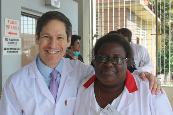 CDC Director, Dr. Tom Frieden, and CAPRISA%26rsquo;s Bernadette Madlala pose at the recent tour of the CAPRISA eThekwini Clinical Research Site in Durban, KwaZulu-Natal, South Africa, as part of the PEPFAR Annual Meeting 2014.