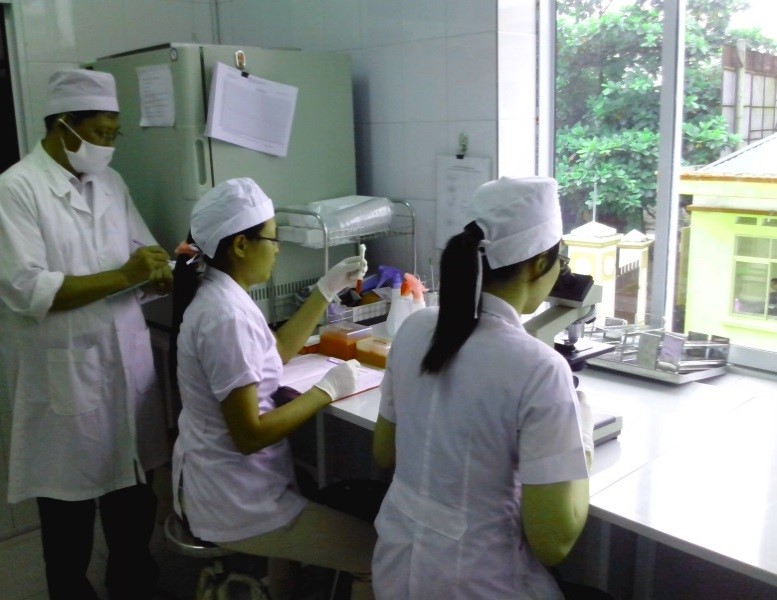 Daily good laboratory practices in Hai Duong PMC:  Laboratory quality manager assesses staff competency.