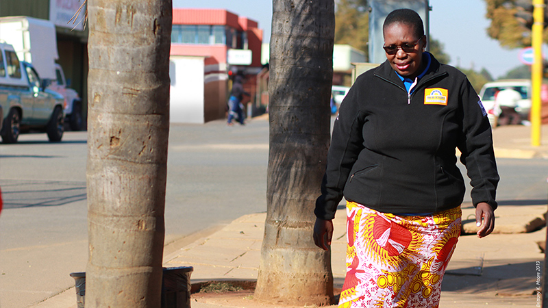 A woman walking down the street - Thembi’s Story