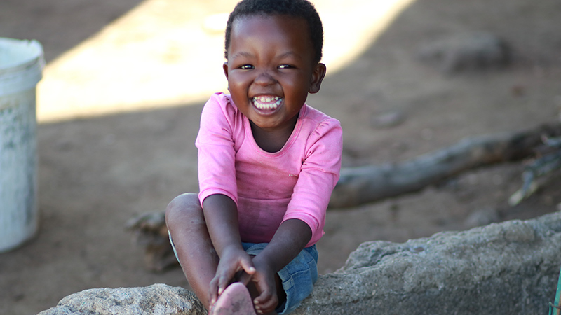 Cute girl smiling - Preventing-HIV-from-Mother-to-Child
