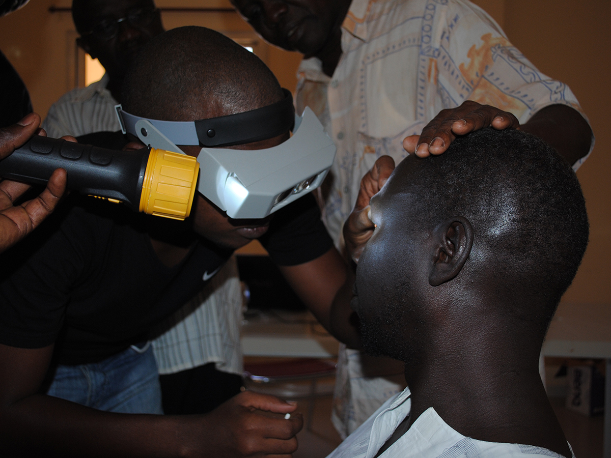 A community health worker conducts screening for trachoma in Senegal. DPDM has been working to develop laboratory tests for trachoma that do not require physical examination of the eye.
