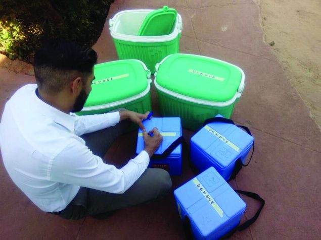 Emergency Public Health Epidemiologist Emilio Dirlikov labels dengue samples in Burkina Faso in 2017 Photo credit : Anselme Sanou (DGHP/Burkina Faso country office).