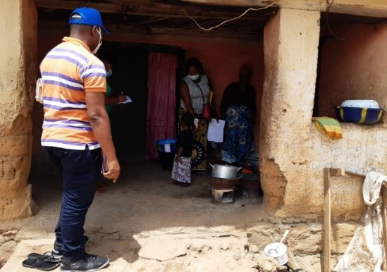 An FETP resident looking for Ebola contacts in a community in Guinea during the 2021 Ebola outbreak.