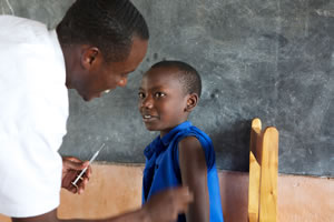 Vaccination of Rwandan boy