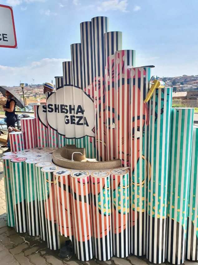 A Shesha Geza hand hygiene station in a high pedestrian traffic area of Ekurhuleni, Gauteng South Africa.