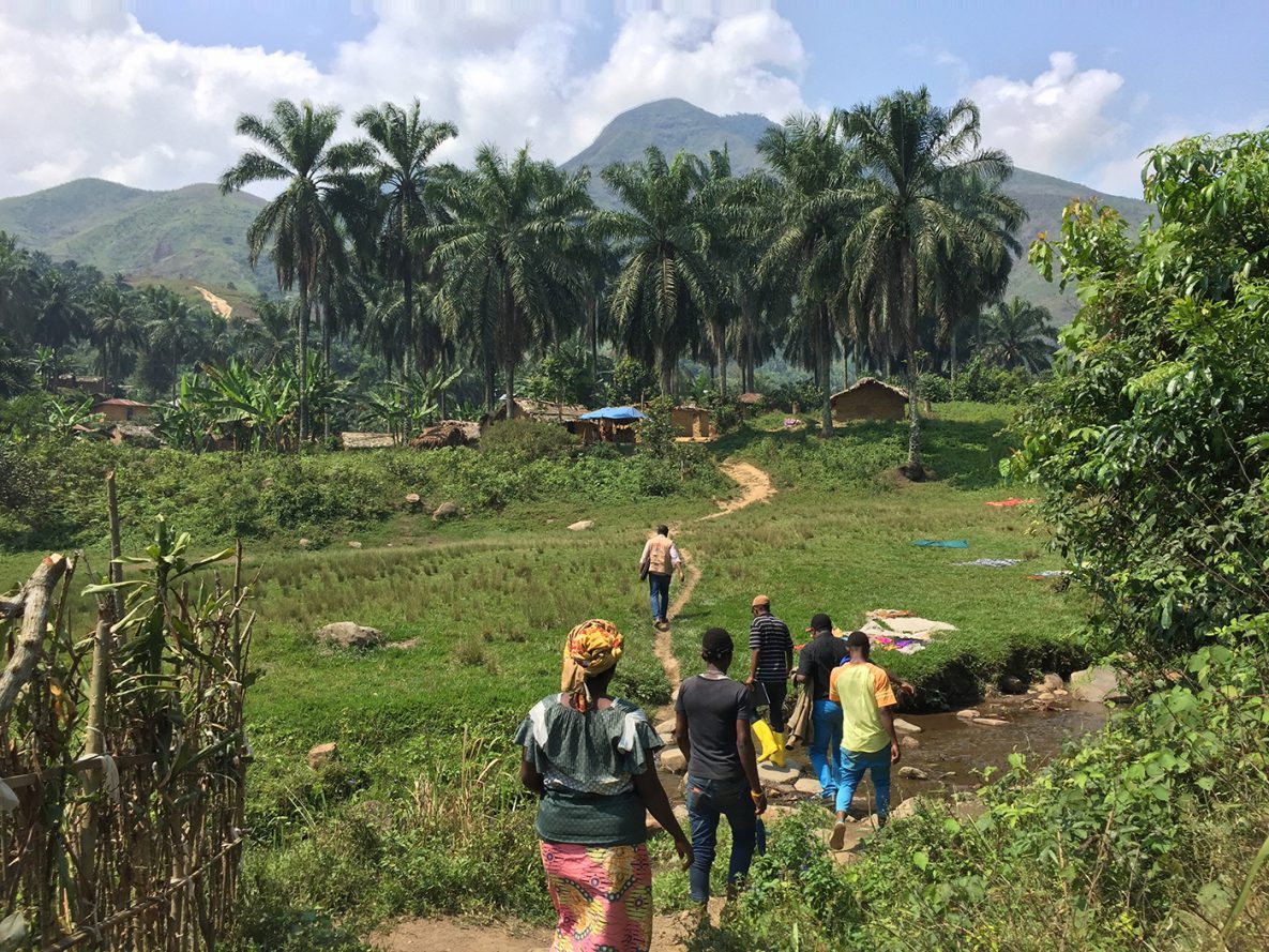 A DRC Ministry of Health surveillance team works with local community healthcare workers to list and monitor all people who came into contact with Ebola cases in Chowe.