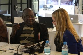 ORISE Fellow, Angela Tripp and workshop participant Francisco Valentino Cabo from Mozambique discuss how to use tobacco prevalence data from his country to develop a tobacco control brief.