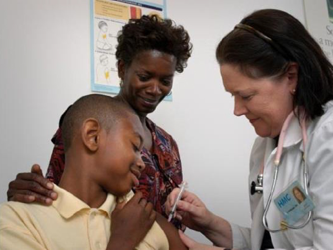 young man getting a shot