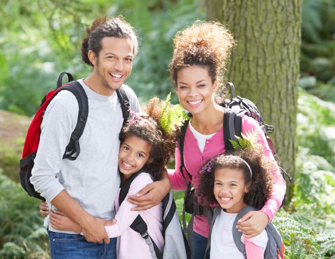 Family of four outdoors