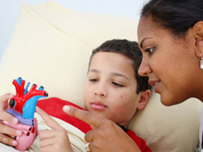 doctor talking to young patient