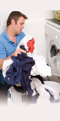 man doing laundry