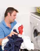 man drying clothes