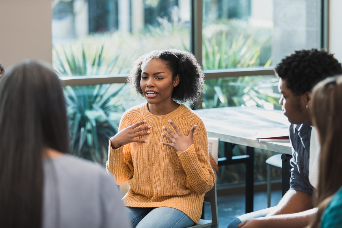 Teenage girl talks about emotions during school therapy session