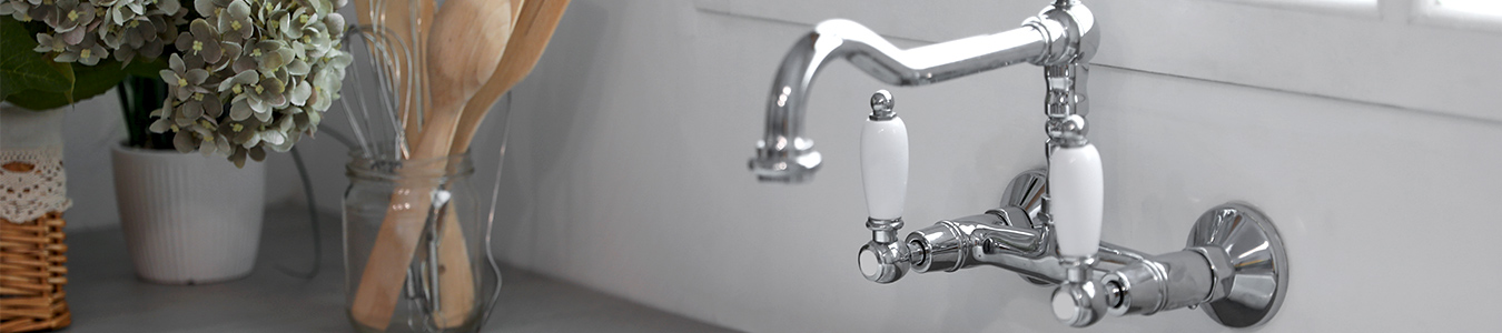 A water faucet in a kitchen.