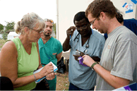 Microbiologist trains workers.