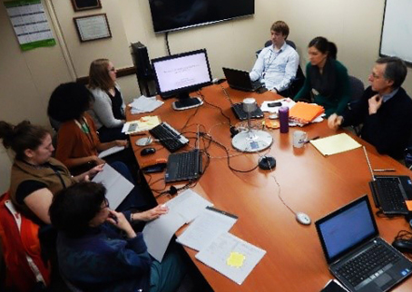 crowded conference room table