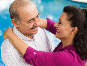 older hispanic couple dancing