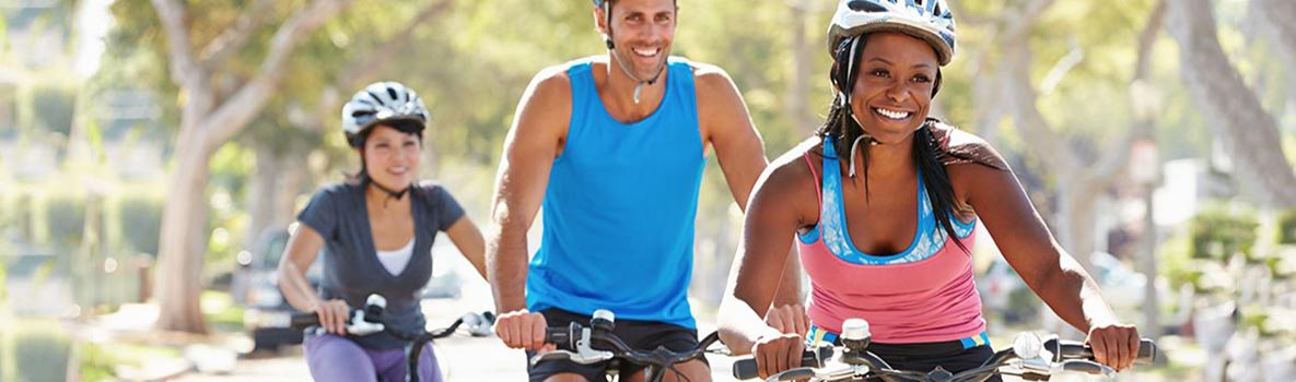 Photo: Three people riding bicycles