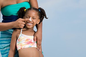 Girl with sunscreen