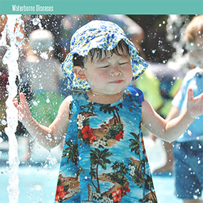 A child playing in a water park.