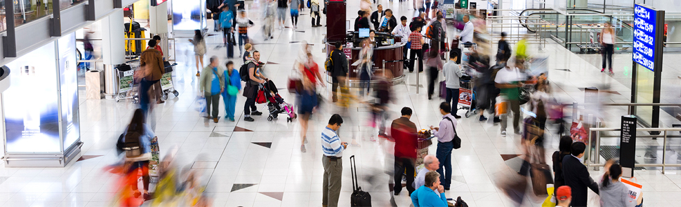 A crowd of people at an airport