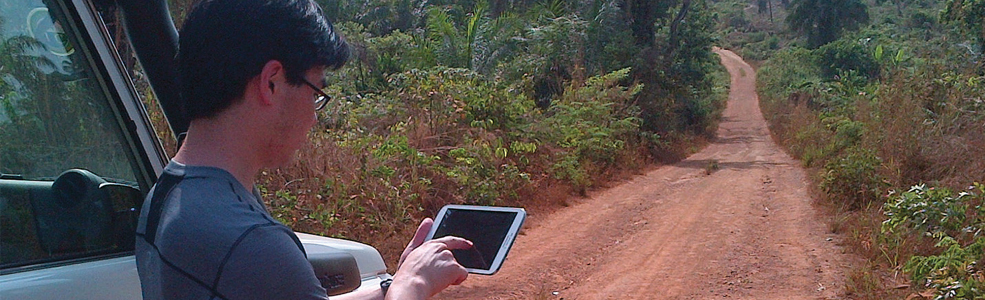 A man looking a tablet