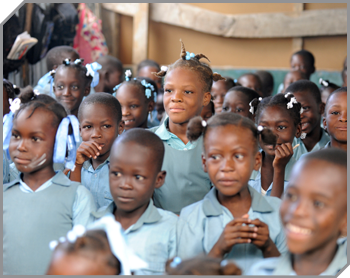 A large crowd of Haitian children in matching school uniforms