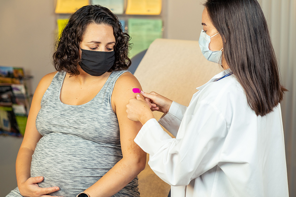 pregnant woman getting vaccinated