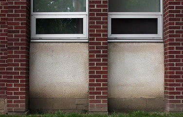 PCB caulk was commonly used to seal the joints of brick, masonry, stone, and metal window frames.