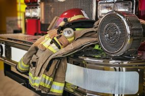 Firefighter protection gear on the fire truck bumper