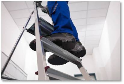 person standing on a ladder