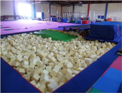 An in-ground pit stocked with replacement foam blocks at one of the four gymnastics studios participating in the study. Photo from NIOSH.