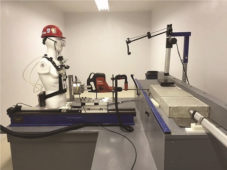 Pneumatic drills produced higher vibration, dust, and noise levels than electric drills tested on a robotic system, shown above. Photo from CPWR.