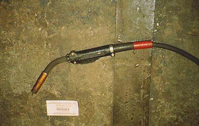 A bent-tip wire-welding handle