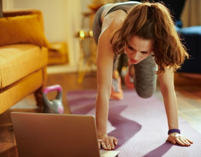 A women doing yoga in her own home