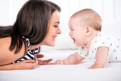 woman facing baby