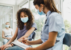 Adolescents at Doctor Office in Masks