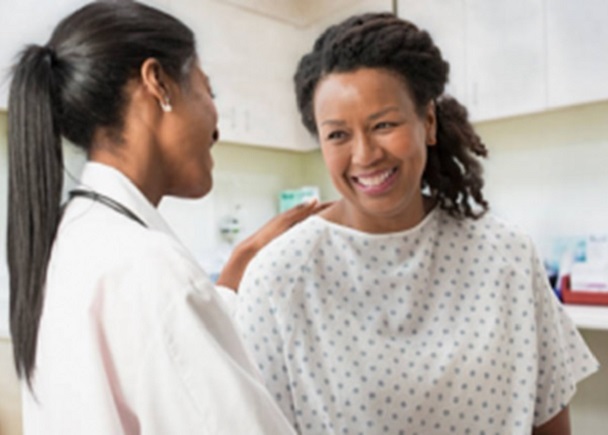 Woman smiling at her doctor