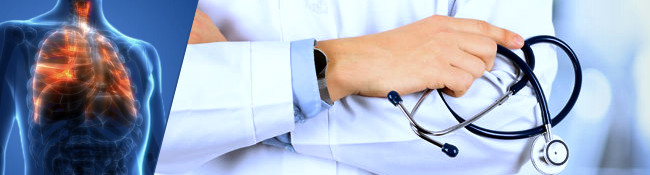 Physician with arms folded holding a stethescope