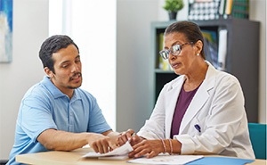 Patient consulting with doctor